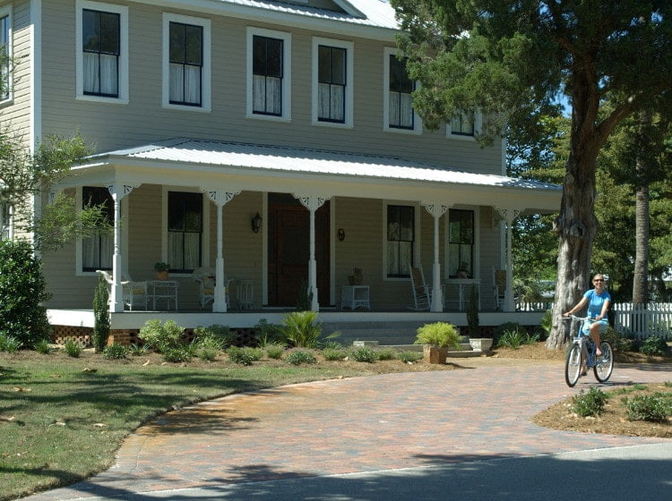Woman Riding Bike in the Apalachicola Historic District