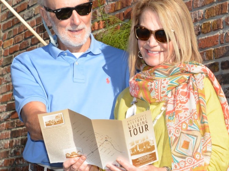 Couple doing the historic walking tour in Apalachicola