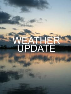 Picture of sunset with the text "Weather Update" over it