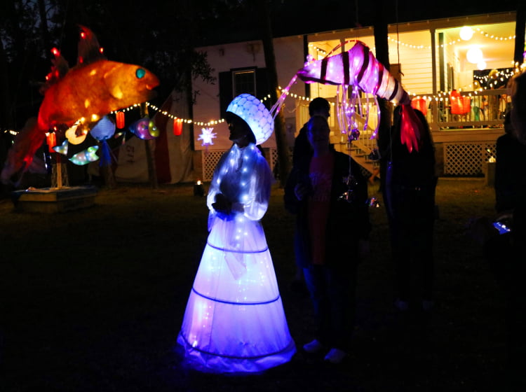 Crooked River Lighthouse Lantern Fest Lady Lit with Lanterns