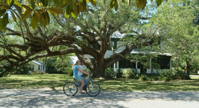 Photo of couple biking through Apalachicola