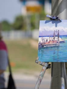 Artists working on painting of Apalachicola FL