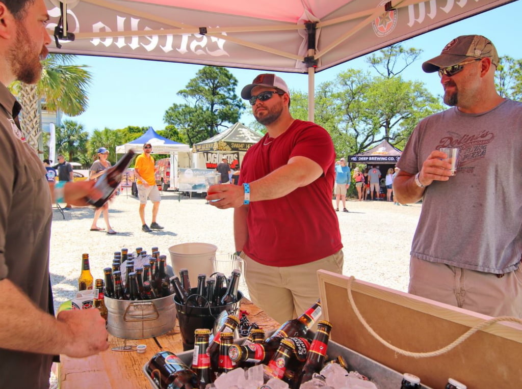 Man receiving beer sample at St. George Island Brewfest.