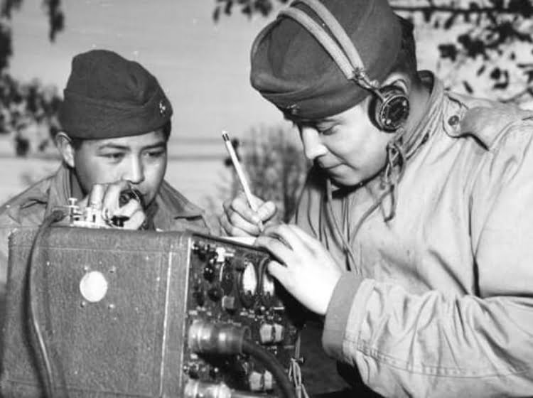 WWII Native American Servicement working on a radio