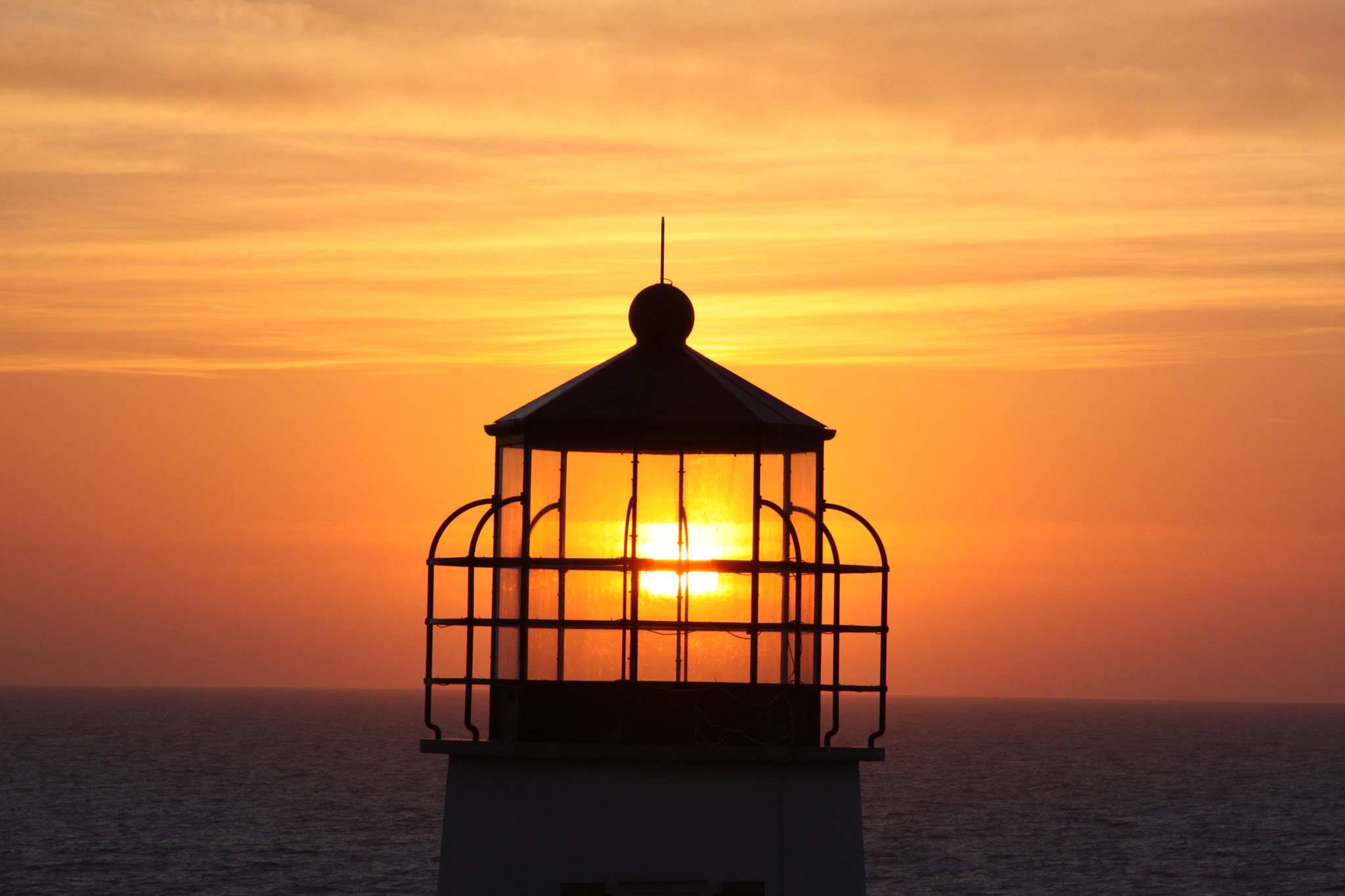 Photo of the Cape St. George Lighthouse during sunset